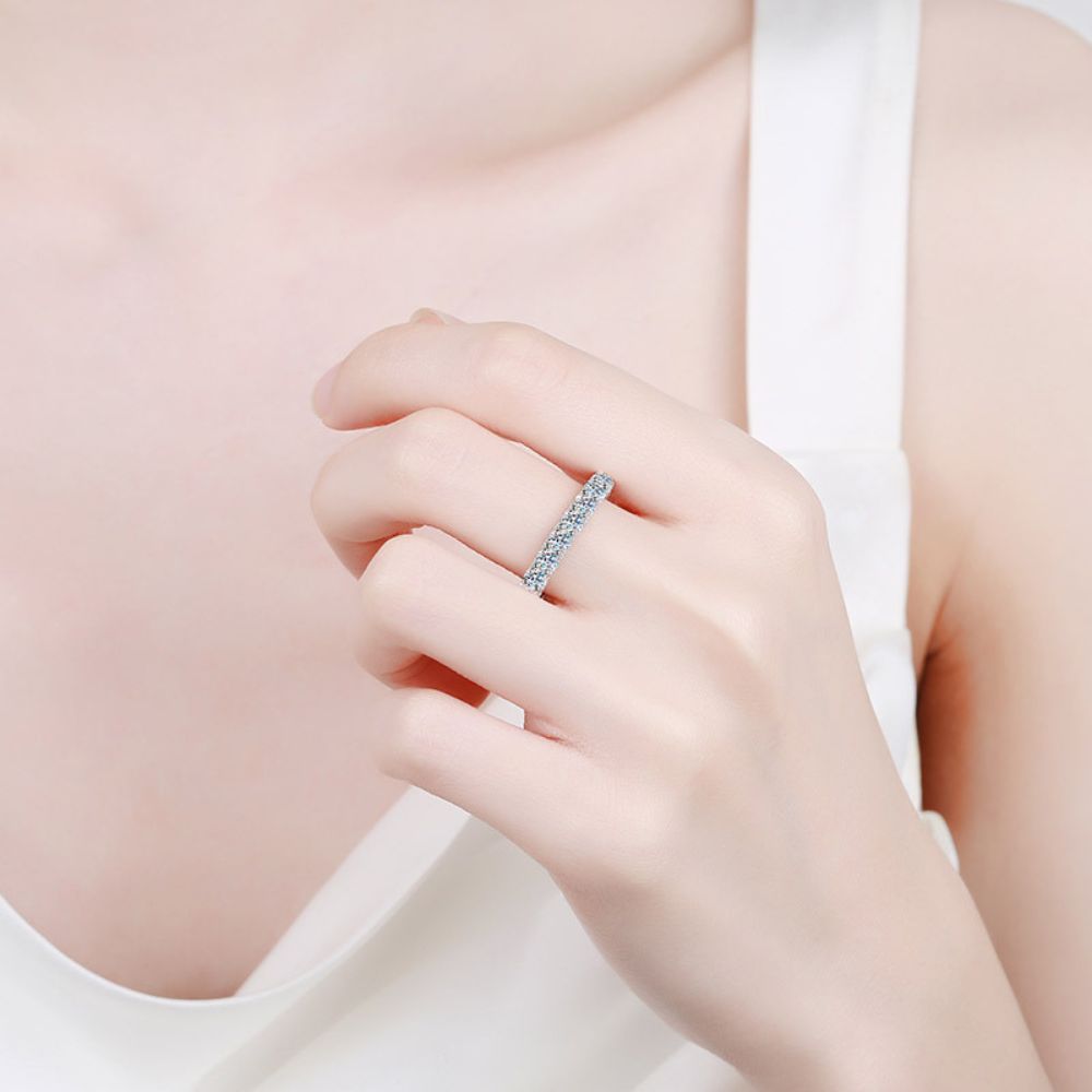 Photo of a woman wearing moissanite silver jewelry ring