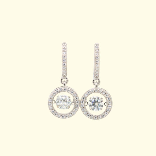 Photo of silver moissanite earrings with diamond